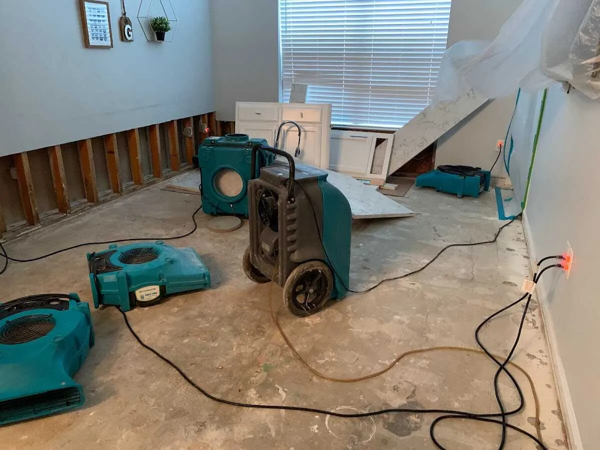Dehumidifier in flood-cut room for Water Damage Restoration in Mableton